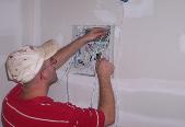Eye Spy Electronics Tech Installing Alarm Panel Gasonade county Missouri